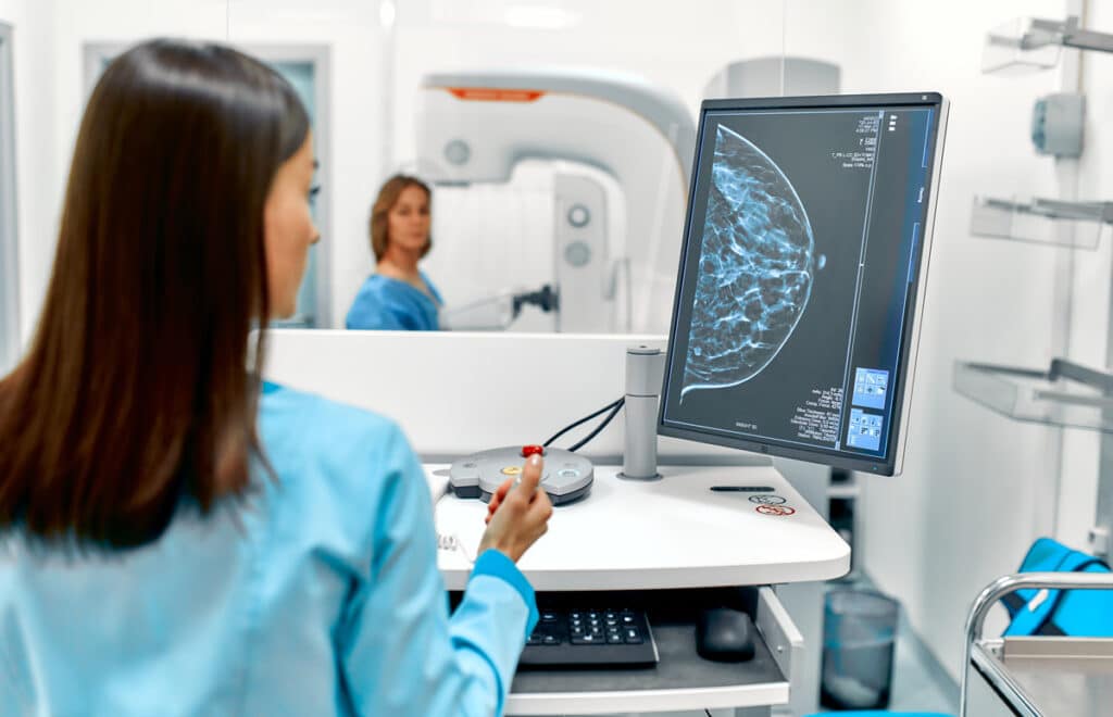 A doctor looking at a mammogram in El Paso.